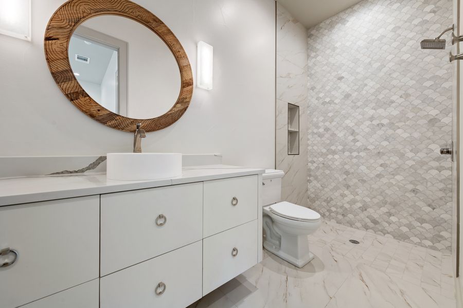 Hallway view with warm finishes and natural light